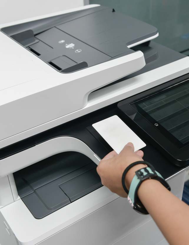 Key card being used on printer